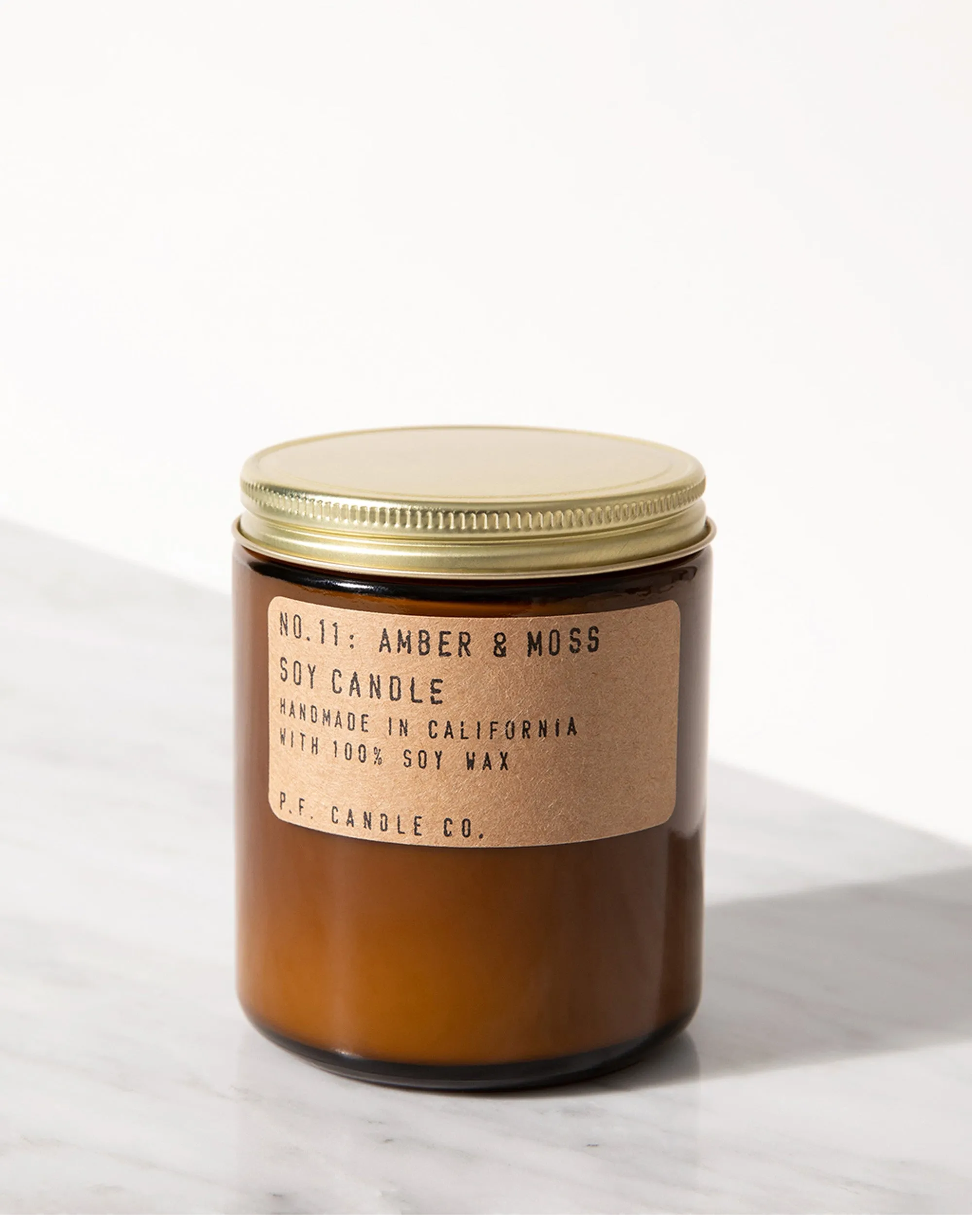P.F. Candle Co. 7.2oz Standard Jar Candle - Amber & Moss